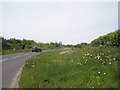 Car in Hawkley Road heading over the A3 bridge