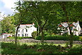 Cottages north of Irton Rd Station through the trees