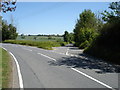 Rural road junction by Hill farm