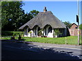 Pretty cottage with unusual gothic style windows