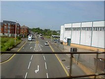 SO9990 : A4182 road from the railway line leaving Sandwell and Dudley station by Steve  Fareham