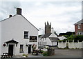 View of  village street and church tower - Lifton