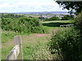 Two open gates by Holcombe Down Road