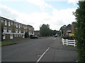 Looking from Firbank Close towards the bus stop in Beechtree Avenue