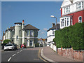 House with tower at junction on St Mary