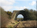 SH4180 : Railway bridge carrying the minor road between Llynfaes and Llannerch-y-medd by Eric Jones