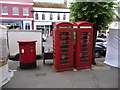 SY4692 : Bridport: postbox № DT6 2000 and phones, West Street by Chris Downer