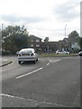 Car joining the London Road roundabout from Roskville Drive