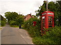 SY9783 : Bushey: postbox № BH20 86 and phone box by Chris Downer