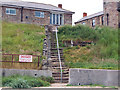 Steps from the small beach beside the harbour, Seahouses