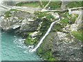 SX0589 : Waterfall, Tintagel Haven by Humphrey Bolton