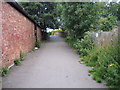 Passageway leading to footbridge