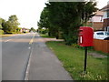 SY9896 : Corfe Mullen: postbox № BH21 152, Wareham Road by Chris Downer