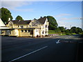 The George & Dragon and the Rough Close milepost