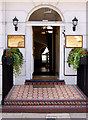 Patterned encaustic tiles and doorway, Gloucester Place, Marylebone