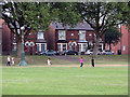 Bathley Street: boys and girl playing cricket