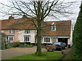 Terraced houses opposite church, Bredfield