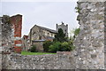 Looking through Abbey House ruins to Waltham Abbey.