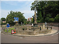 NU2410 : Roundabout with war memorial by Stephen Craven