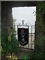 Wrought iron gate with crest