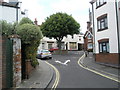 Mini-roundabout at the junction of Church and  Village Roads