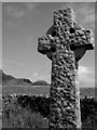 NG2705 : Memorial cross in Canna's Church of Scotland graveyard by Lisa Jarvis