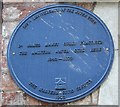 Gully plaque on the Tudor Hotel