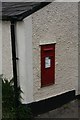 Post box in the wall