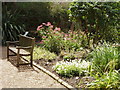 Bench and flower bed at Chelsea Physic Garden