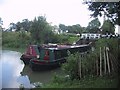 ST9861 : Narrow boats leave an upper lock at the top of the Caen Hill flight by Sarah Charlesworth
