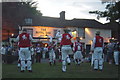 Morris Men on Green in front of Pub