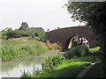 Aylesbury Arm: A narrowboat passes under Canal Bridge No 13