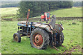 Old tractor and new excavator