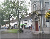 J3436 : Shops in the Upper Square at Castlewellan by Eric Jones