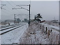NU2312 : Lesbury Station in the snow by William Stafford