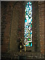 Stained glass window on the west wall at St Peter