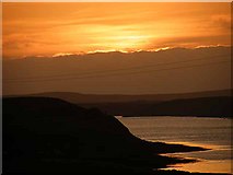 NF8863 : Sunset over Loch Euphort by Oliver Dixon