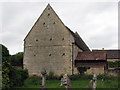 Barrowden: old stone barn next to the churchyard