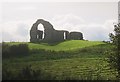 J5638 : The ruined St Nicholas Church at Ardtole, Ardglass by Eric Jones
