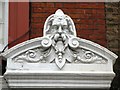 Hirsute man on a building in Chiltern Street, W1