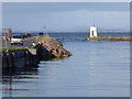 NH8857 : Piers at the mouth of the River Nairn by Stanley Howe