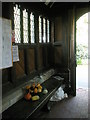 Seat in the church porch at St Bartholomew, Rogate