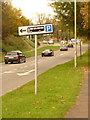 Shaftesbury: bus parking signpost (left-facing symbol)