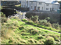 Footbridge crossing stream in Blaenau Ffestiniog