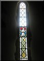 Stained glass window on the south wall at St Mary, Climping