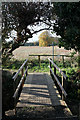 Footbridge with open countryside beyond