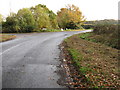 Road junction between Foxbridge Lane to the left and Rickman