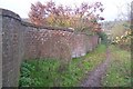 Curved wall beside Sepham Farm