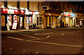 Shops on Coventry Street, Southam, at night