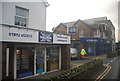 Shops on the High St, Crowborough at its junction with Nevill Rd